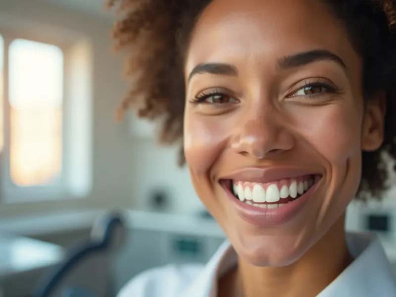 patient achieving confident smile makeover with full arch dental implants