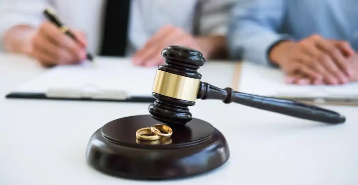 judge gavel and wedding rings during divorce proceedings